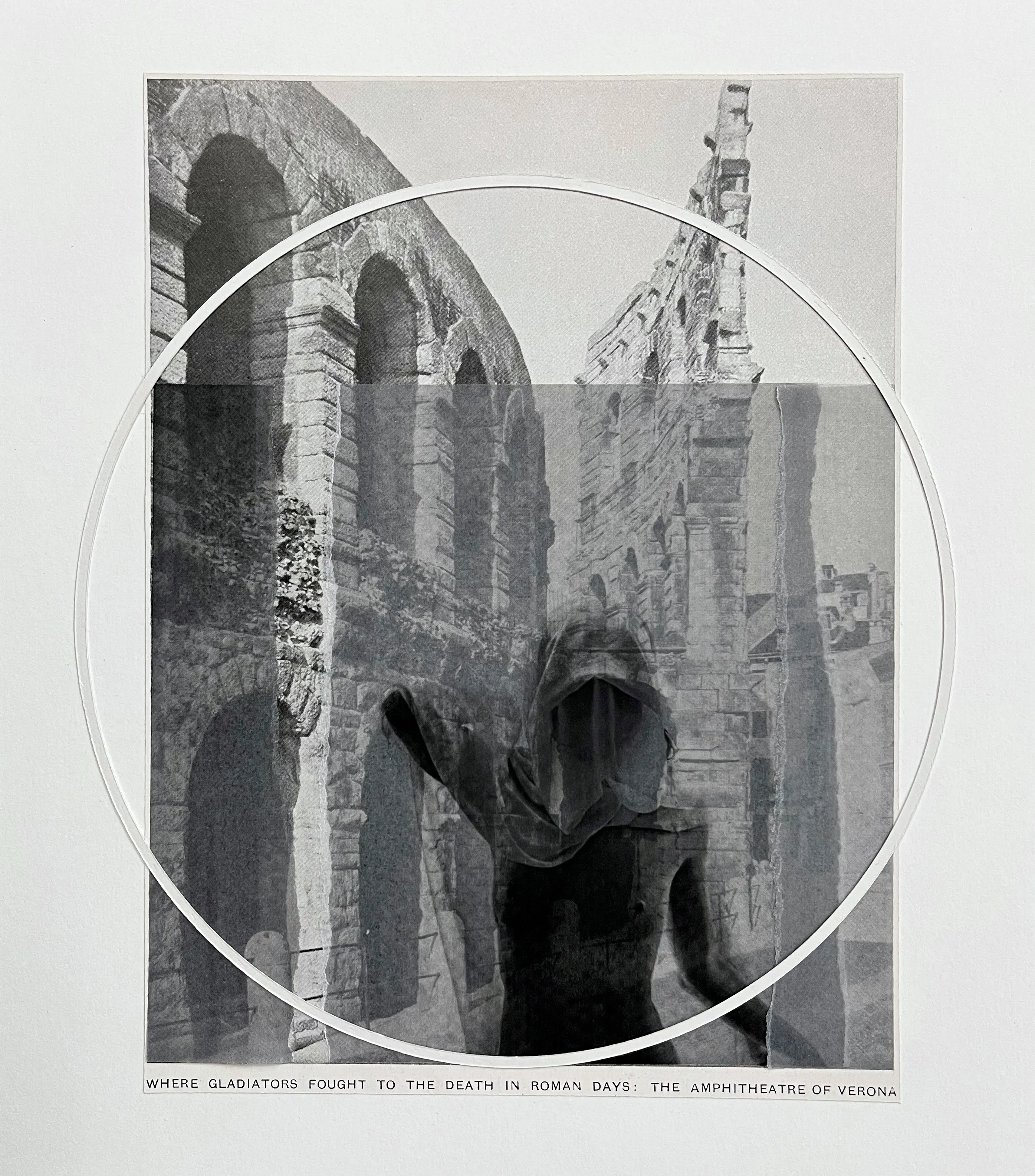 Close photograph of a small metal object on white ground, archaeological survey style